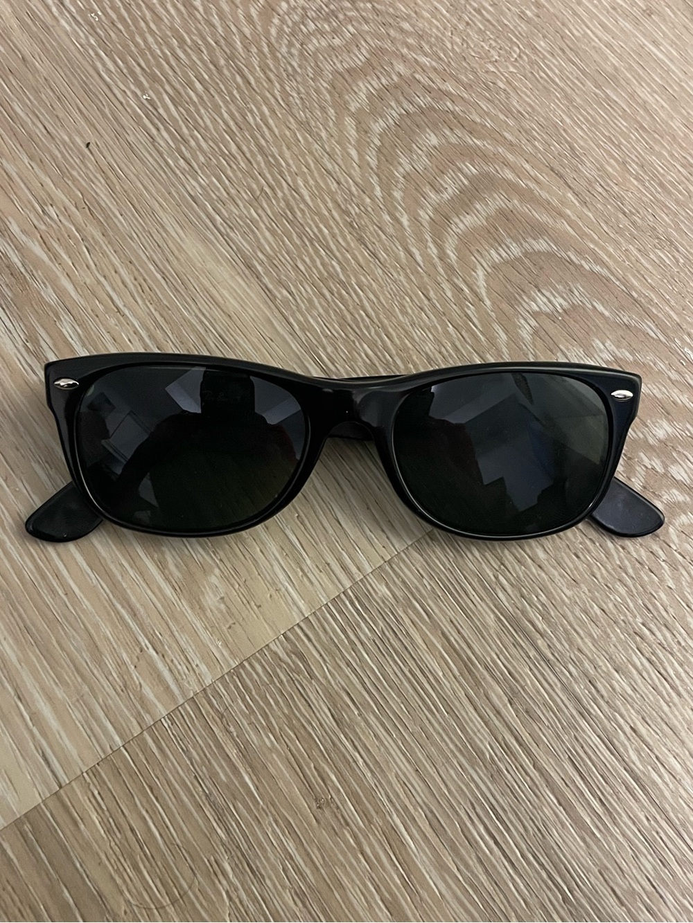 Ray-Ban Black Frame Sunglasses with Dark Lenses